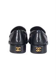 Chanel - Black Leather Floral Textured Logo Front Loafer Sz 6.5 - Current Boutique