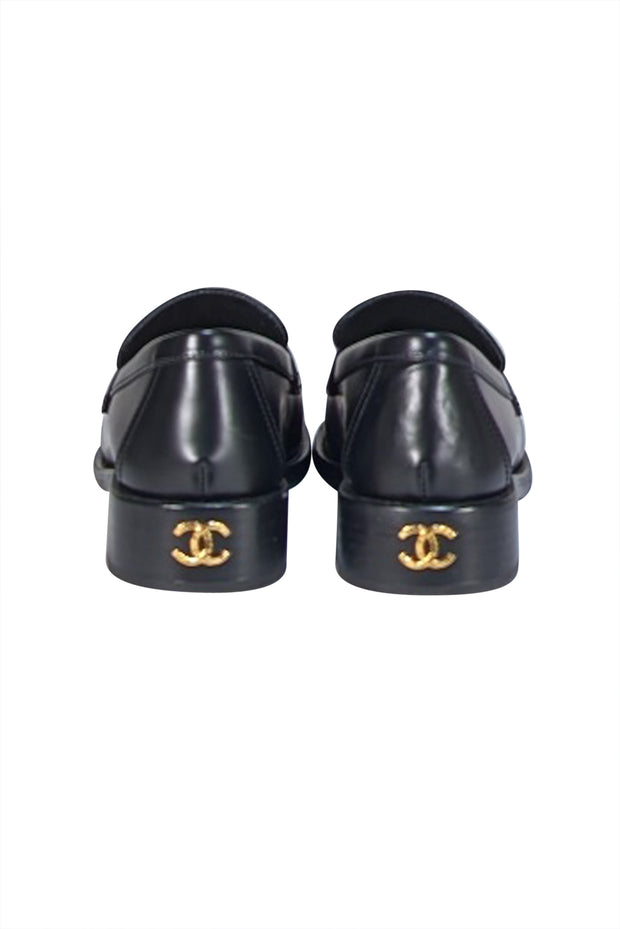 Chanel - Black Leather Floral Textured Logo Front Loafer Sz 6.5 - Current Boutique