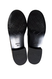 Chanel - Black Leather Floral Textured Logo Front Loafer Sz 6.5 - Current Boutique